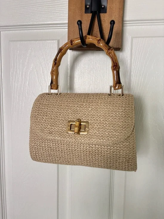 Elegant Woven Straw Bag with Bamboo Top Handle in Natural Color - Picture 2 of 5